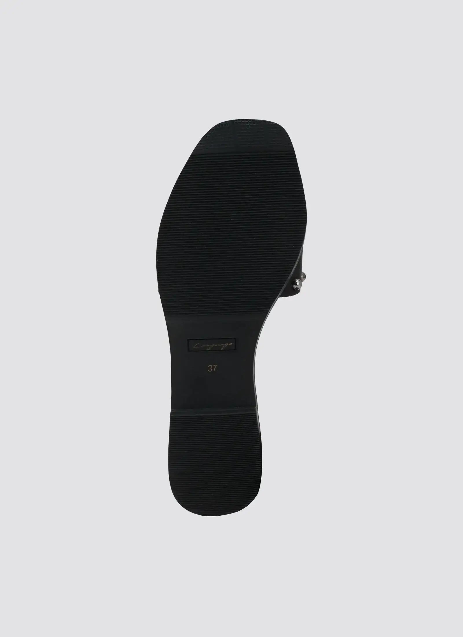 Bottom view of a black women's shoe with textured sole and size 37 marking 