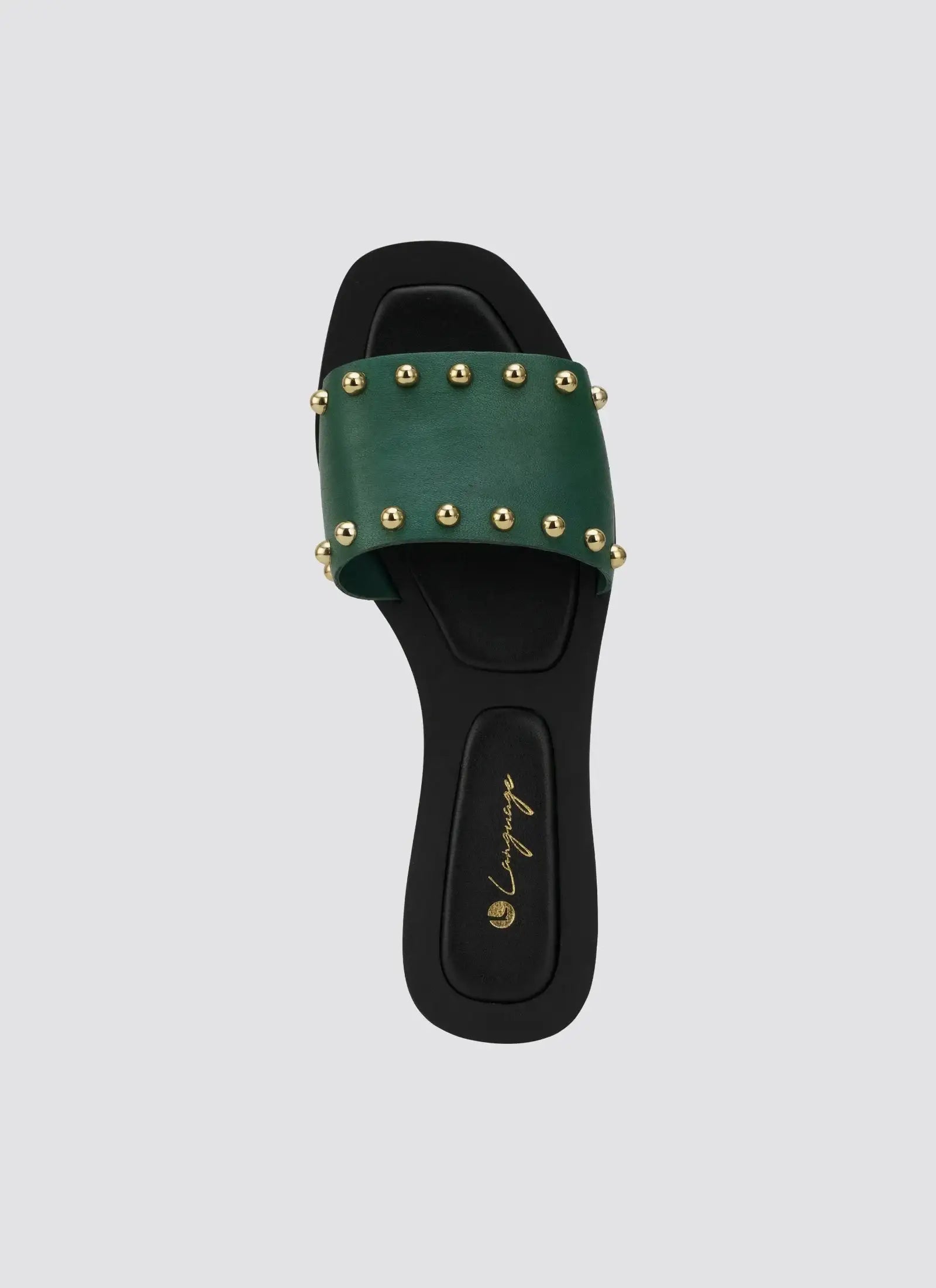 Green leather slide sandal with gold stud accents and black sole, front view 