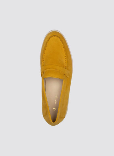 Top view of mustard yellow suede loafer shoe for men with penny strap detail  