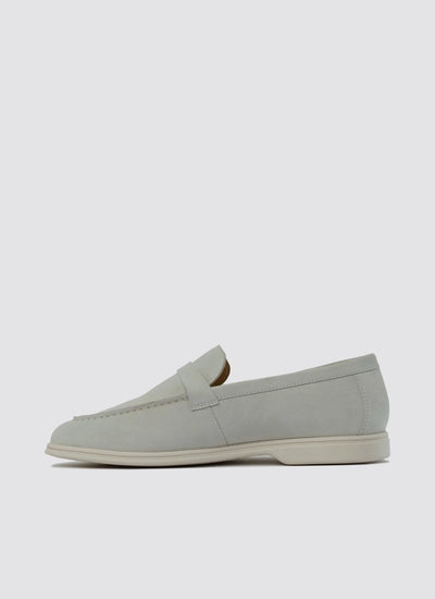 Off-white suede loafer for men, side view, slip-on formal shoe with minimal stitching 