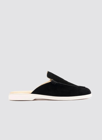 Black suede slip-on loafer mule with white sole for men, side profile view 