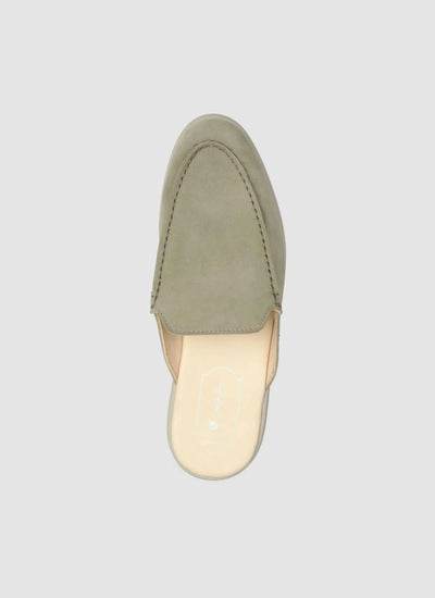 Light olive suede leather mule shoe, slip-on loafer style, top view on white background 