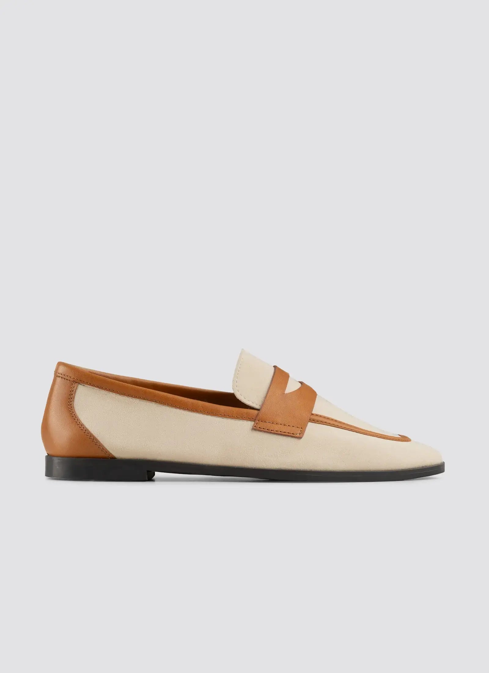Two-tone loafer with brown and beige colors on a light gray background  