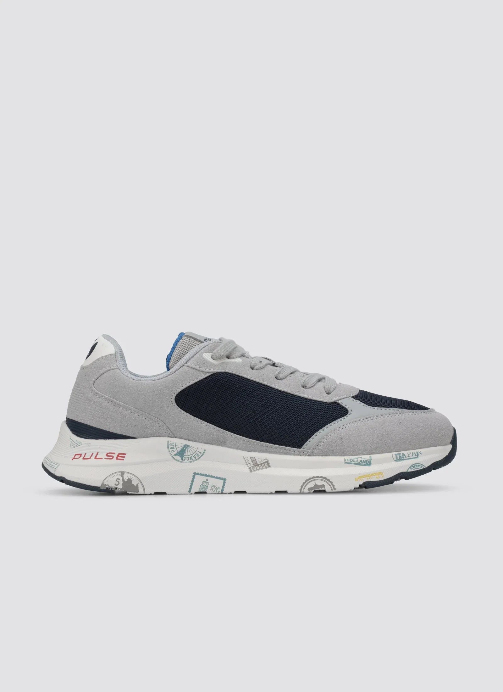 Grey and navy blue men's sneaker with travel stamp print sole, side view on white background #color_navy-grey