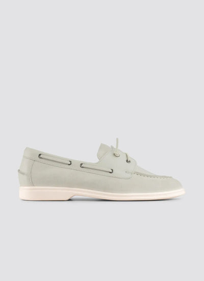 Light gray boat shoe on a light gray background 