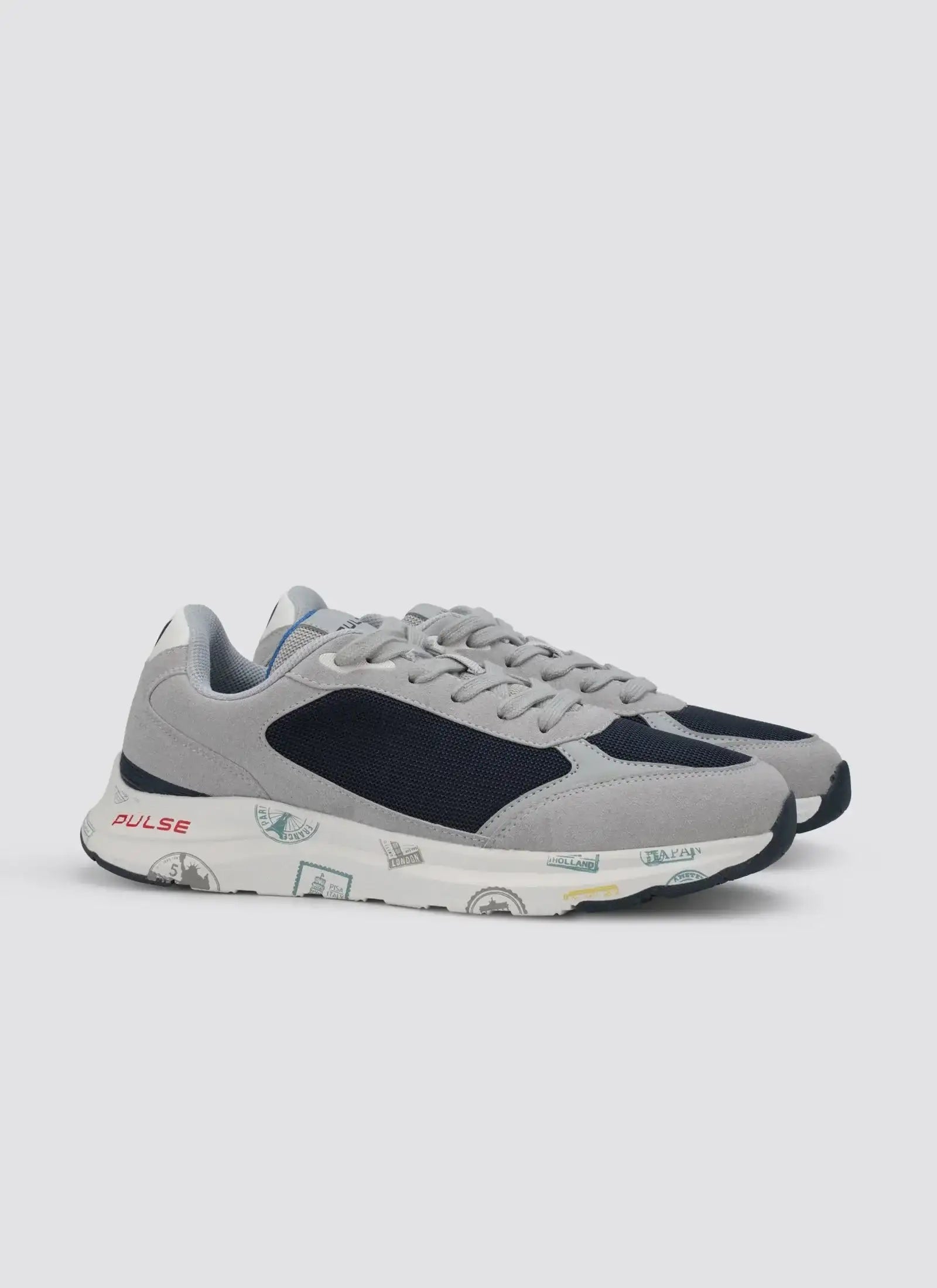 Gray and navy casual sneakers for men with stamp print sole, side view on white background 