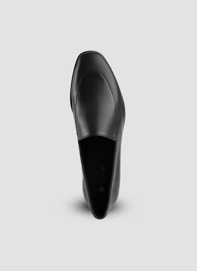 Black shoe on a light gray background 