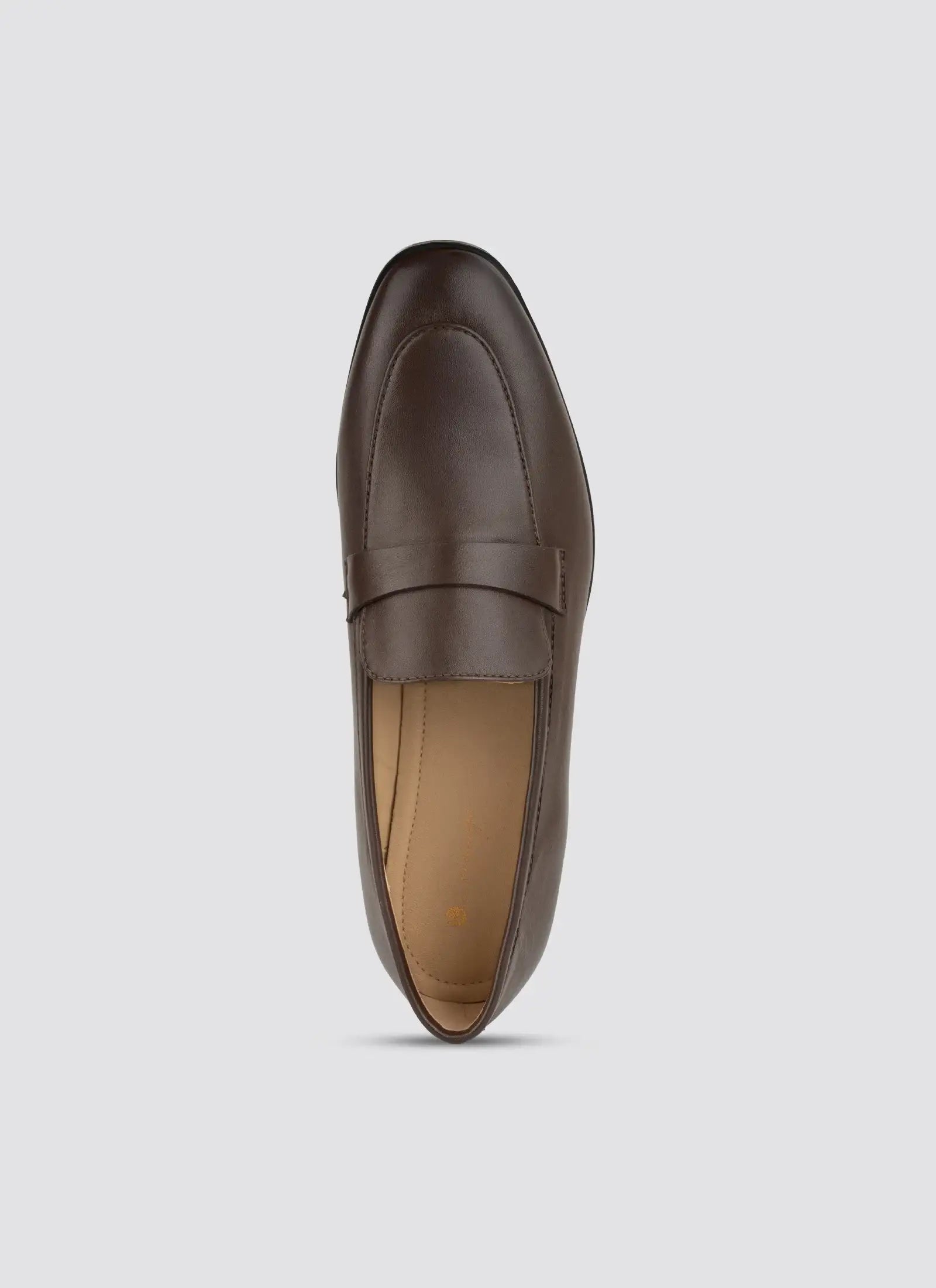 Brown leather loafer on a light gray background 