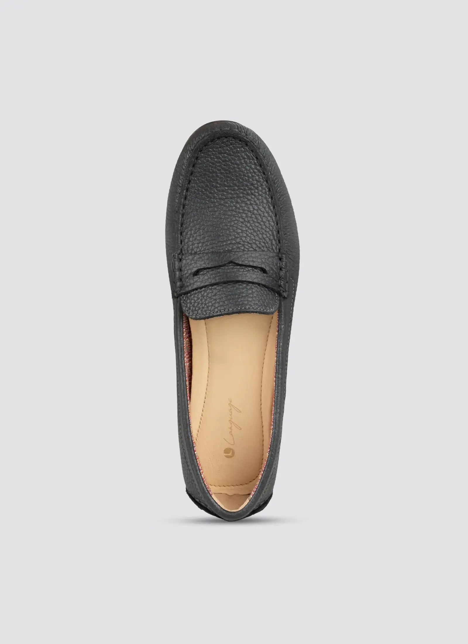 Gray loafer shoe on a light gray background 