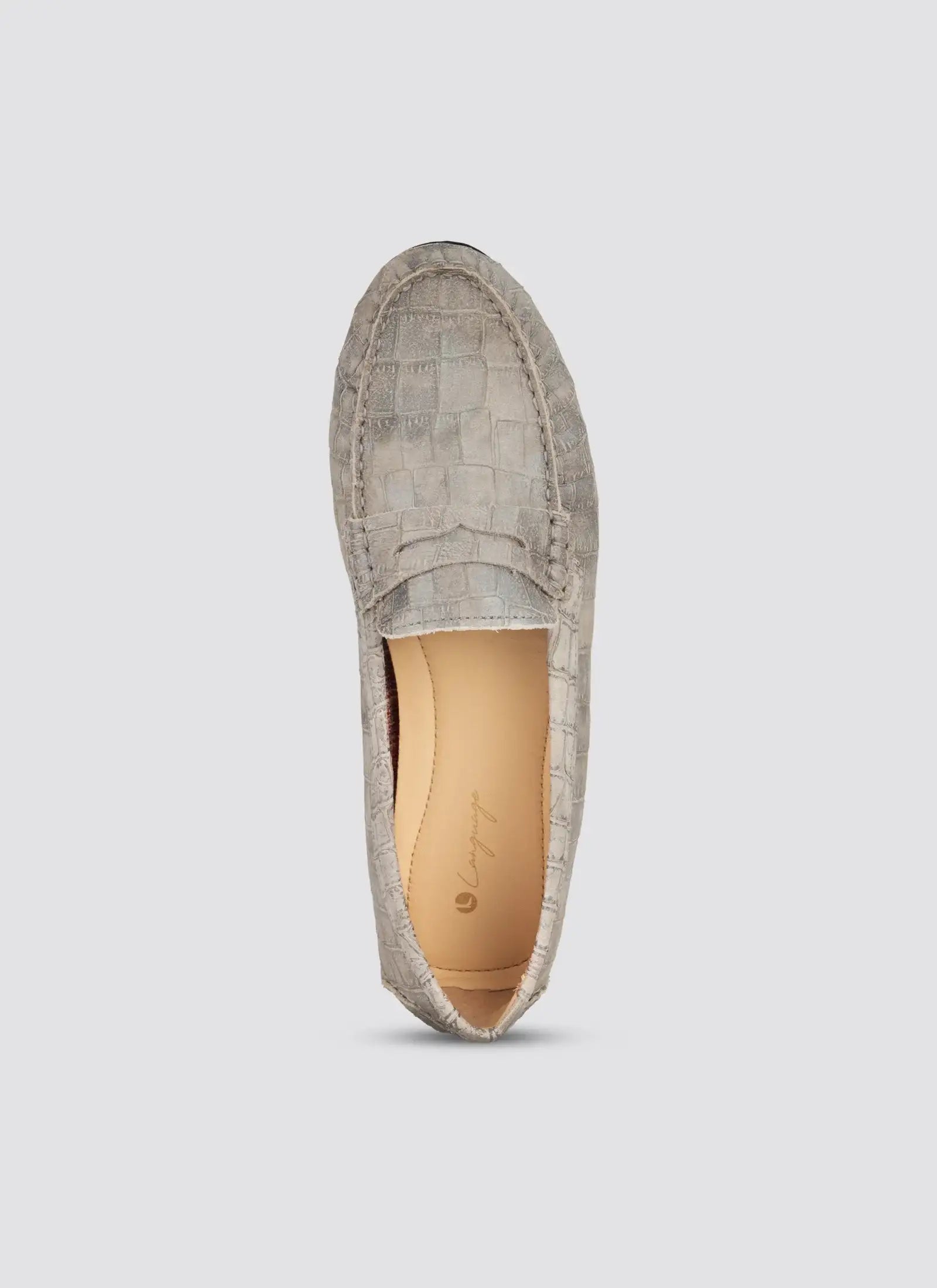 Gray textured loafer shoe on a light gray background 
