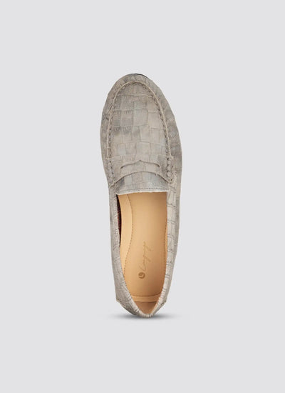 Gray textured loafer shoe on a light gray background 